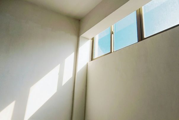 Plain white walls with window