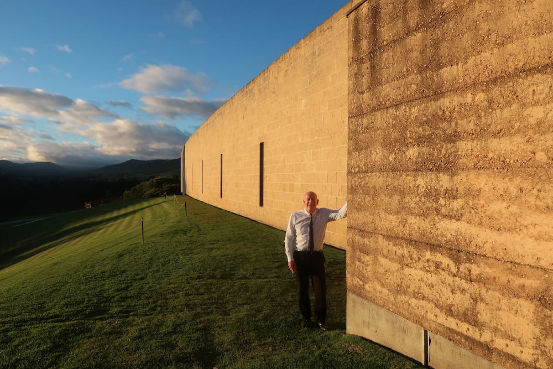 Tony Dutton standing in front of his museum